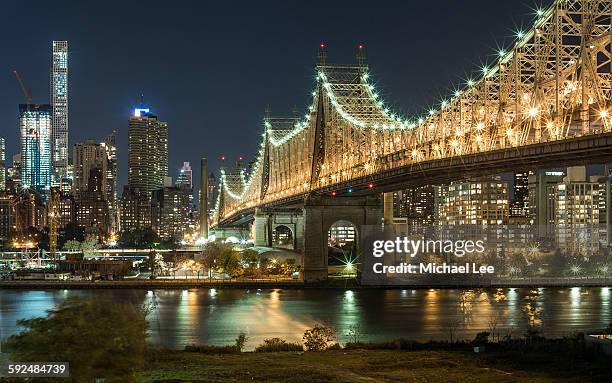 night view of queensboro bridge - new york - クイーンズボロ橋 ストックフォトと画像