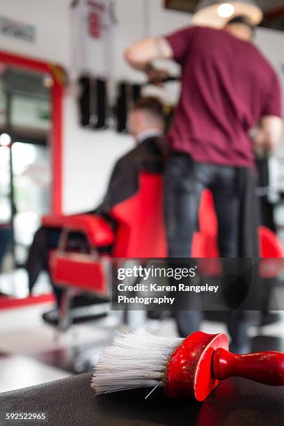 Tools of the trade for barber Will as Sykes his clients hair.