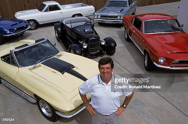 Bruce Lietzke poses with his car collection at his home in Plano, Texas. His cars are, clockwise from lower left, a 1967 Corvette C2 427, a blue late...