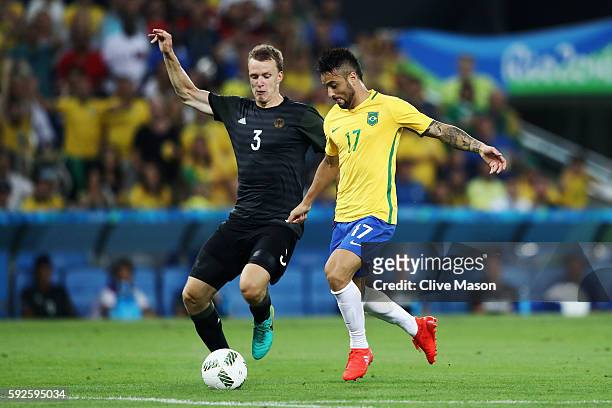 Lukas Klostermann of Germany and Felipe Anderson of Brazil in action during the Men's Football Final between Brazil and Germany at the Maracana...
