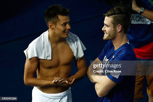 Silver medalist German Sanchez of Mexico celebrates with Bronze medalist David Boudia of the United States after the Men's Diving 10m Platform on Day...