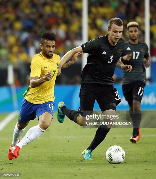 Brazil's forward Felipe Anderson and Germany's defender Lukas Klostermann vie for the ball during the Rio 2016 Olympic Games men's football gold...