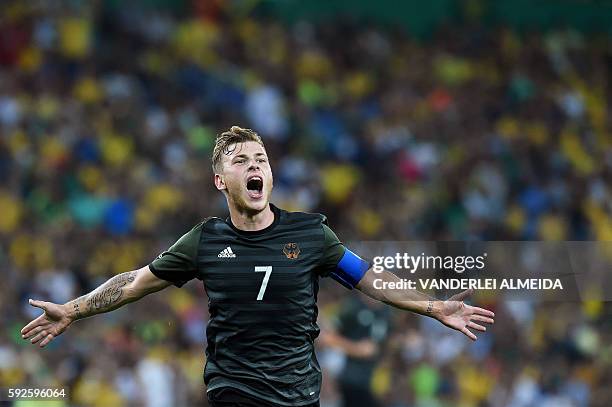 Germany's midfielder Maximilian Meyer scores his team's first goal during the Rio 2016 Olympic Games men's football gold medal match between Brazil...