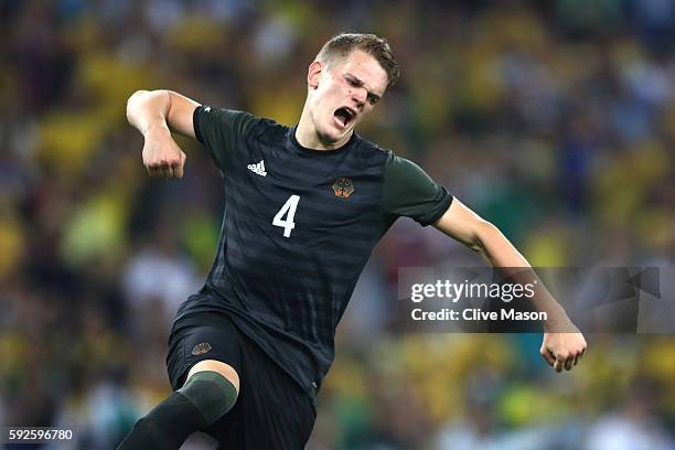 Matthias Lukas Ginter of Germany celebrates scoring his penalty in the shoot out during the Men's Football Final between Brazil and Germany at the...