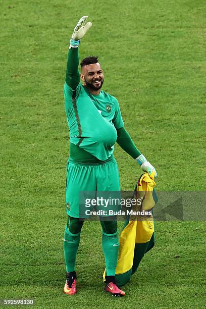 Weverton the Brazil goalkeeper celebrates as Brazil win the penalty shoot out in the Men's Football Final between Brazil and Germany at the Maracana...