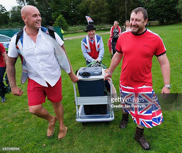 Group of friends arrive at the annual classical Proms Spectacular concert held on the north lawn of Castle Howard on August 20 2016 in York, England....