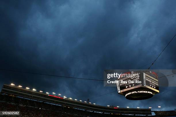 Severe weather warning is seen on the Colossus scoreboard prior to the NASCAR Sprint Cup Series Bass Pro Shops NRA Night Race at Bristol Motor...