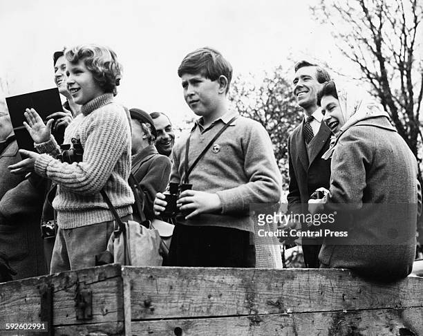 Queen Elizabeth II watching the Badminton Horse Trials with Princess Anne and Prince Charles, Gloucestershire, July 1971.