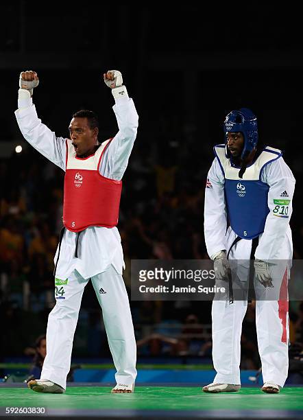Maicon Siqueira of Brazil celebrates after defeating Mahama Cho of Great Britain during the Men's +80kg Bronze Medal contest on Day 15 of the Rio...