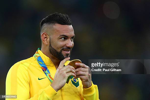 Weverton the Brazilian goalkeeper celebrates after the Men's Football Final between Brazil and Germany at the Maracana Stadium on Day 15 of the Rio...