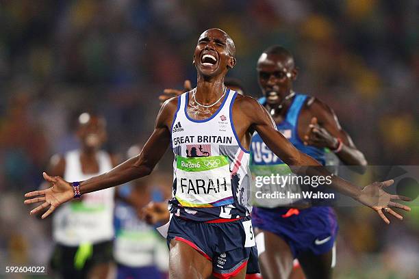 Mohamed Farah of Great Britain reacts after winning gold in the Men's 5000 meter Final on Day 15 of the Rio 2016 Olympic Games at the Olympic Stadium...