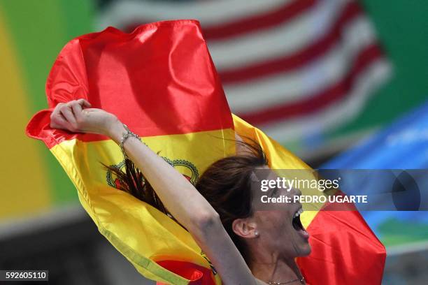 Spain's Ruth Beitia celebrates after she won the Women's High Jump Final during the athletics event at the Rio 2016 Olympic Games at the Olympic...