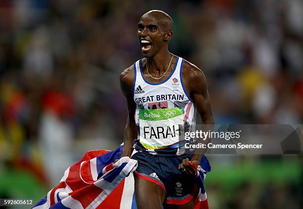 Mohamed Farah of Great Britain reacts after winning gold in the Men's 5000 meter Final on Day 15 of the Rio 2016 Olympic Games at the Olympic Stadium...