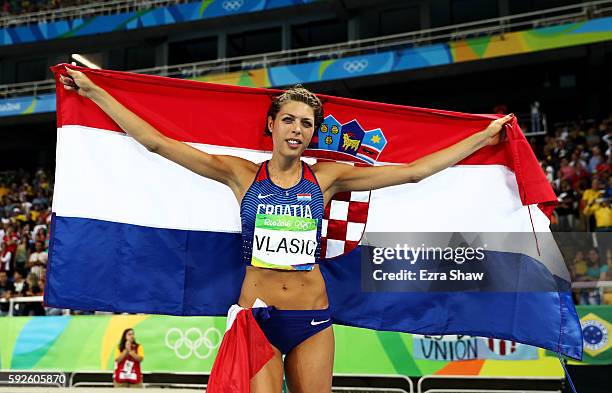 Blanka Vlasic of Croatia reacts after winning bronze in the Women's High Jump Final on Day 15 of the Rio 2016 Olympic Games at the Olympic Stadium on...