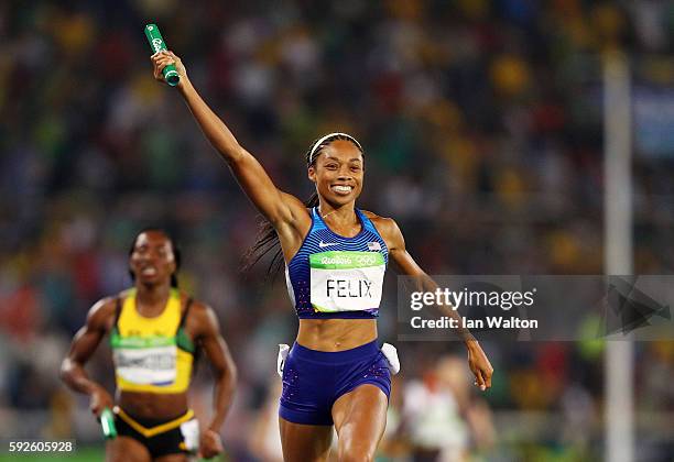 Allyson Felix of the United States reacts after winning gold during the Women's 4 x 400 meter Relay on Day 15 of the Rio 2016 Olympic Games at the...