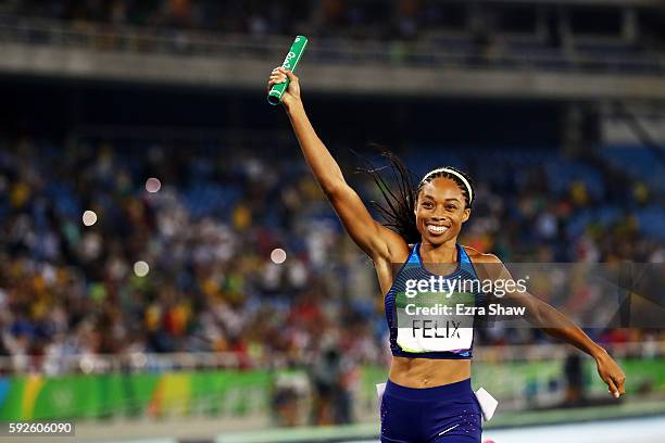 Allyson Felix of the United States reacts after winning gold during the Women's 4 x 400 meter Relay on Day 15 of the Rio 2016 Olympic Games at the...