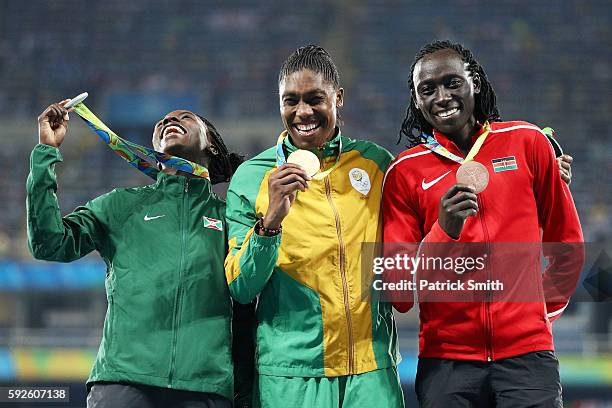 Silver medalist Francine Niyonsaba of Burundi, gold medalist Caster Semenya of South Africa and bronze medalist Margaret Nyairera Wambui of Kenya...