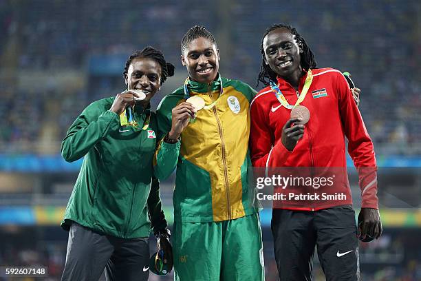 Silver medalist Francine Niyonsaba of Burundi, gold medalist Caster Semenya of South Africa and bronze medalist Margaret Nyairera Wambui of Kenya...