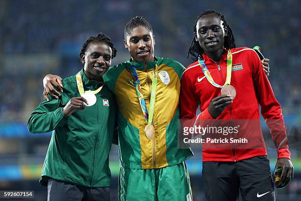 Silver medalist Francine Niyonsaba of Burundi, gold medalist Caster Semenya of South Africa and bronze medalist Margaret Nyairera Wambui of Kenya...
