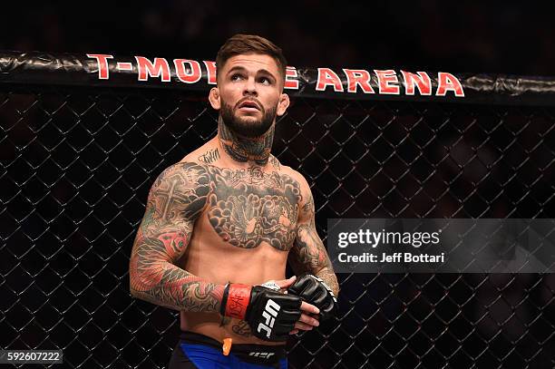 Cody Garbrandt celebrates after defeating Takeya Mizugaki of Japan in their bantamweight bout during the UFC 202 event at T-Mobile Arena on August...