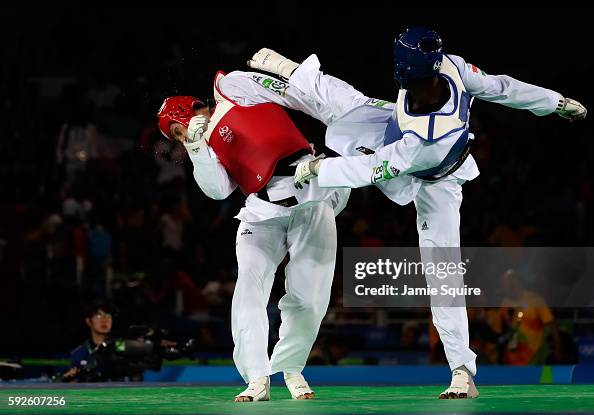 Abdoulrazak Issoufou Alfaga of Niger competes against Radik Isaev of