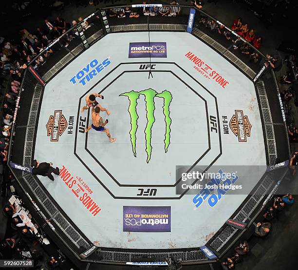 Cody Garbrandt fights Takeya Mizugaki of Japan in their bantamweight bout during the UFC 202 event at T-Mobile Arena on August 20, 2016 in Las Vegas,...