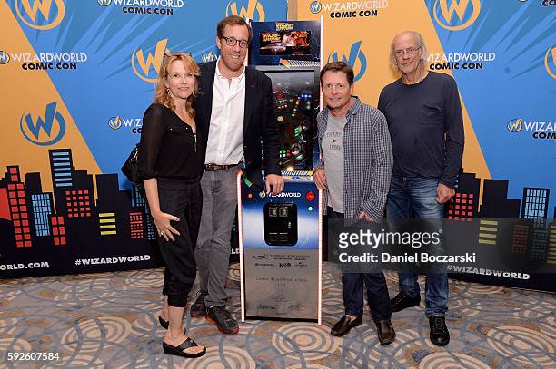 Actress Lea Thompson, Filmmaker Rob Minkoff, Actor Michael J. Fox and Actor Christopher Lloyd attend Wizard World Comic Con Chicago 2016 - Day 3 at...