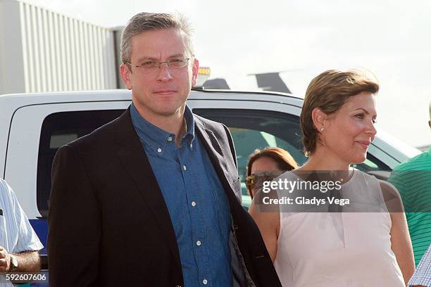 Governor of Puerto Rico Alejandro Garcia Padilla and First Lady Wilma Pastrana arrives as part of Gold Medalist Monica Puig arrival at Luis Munoz...