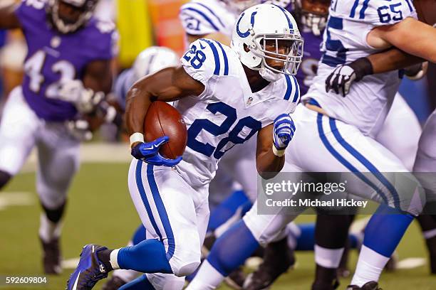 Jordan Todman of the Indianapolis Colts runs the ball against the Baltimore Ravens at Lucas Oil Stadium on August 20, 2016 in Indianapolis, Indiana.