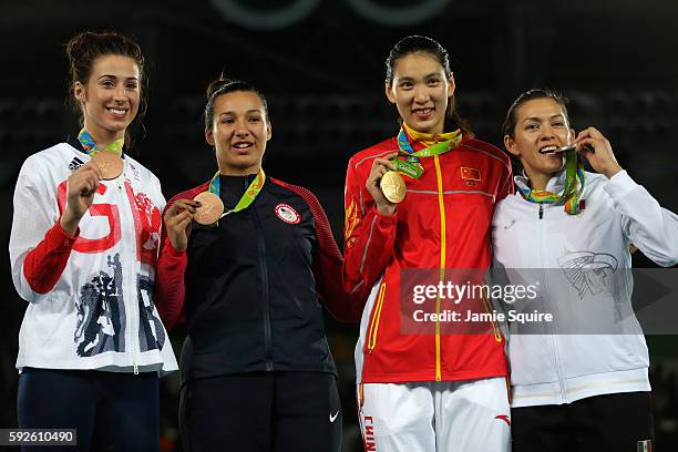 Silver medalist Maria del Rosario Espinoza Espinoza of Mexico, Gold medalist Shuyin Zheng of China and Bronze medalists Jackie Galloway of the United...