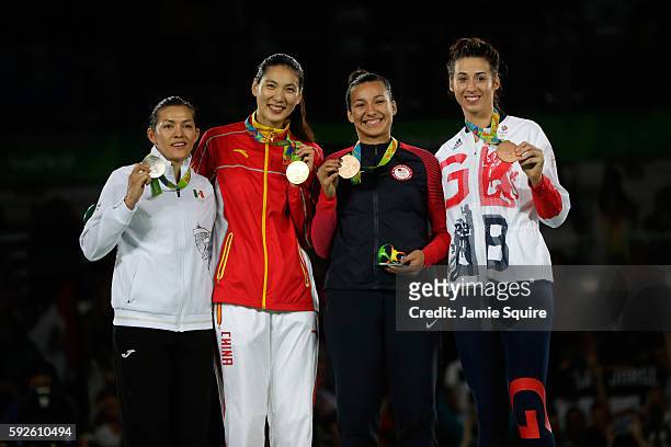 Silver medalist Maria del Rosario Espinoza Espinoza of Mexico, Gold medalist Shuyin Zheng of China and Bronze medalists Jackie Galloway of the United...