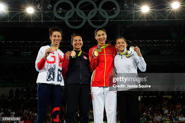 Silver medalist Maria del Rosario Espinoza Espinoza of Mexico, Gold medalist Shuyin Zheng of China and Bronze medalists Jackie Galloway of the United...