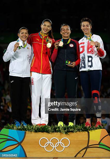 Silver medalist Maria del Rosario Espinoza Espinoza of Mexico, Gold medalist Shuyin Zheng of China and Bronze medalists Jackie Galloway of the United...