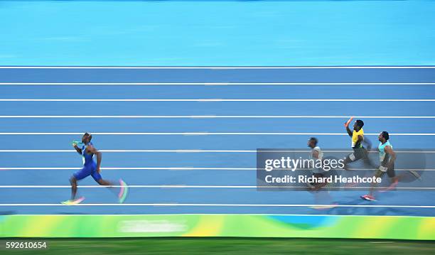 Lashawn Merritt of the United States leads the field during the Men's 4 x 400 meter Relay on Day 15 of the Rio 2016 Olympic Games at the Olympic...