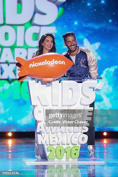 Adriana Louvier and Erick Elias speak on stage during the Nickelodeon Kids' Choice Awards Mexico 2016 at Auditorio Nacional on August 20, 2016 in...