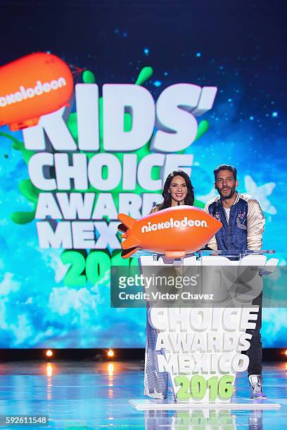Adriana Louvier and Erick Elias speak on stage during the Nickelodeon Kids' Choice Awards Mexico 2016 at Auditorio Nacional on August 20, 2016 in...