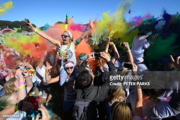 Runner participates in the annual Color Run in Centennial Park in Sydney on August 21, 2016. - The Color Run is a 5km fun run started in the US in...