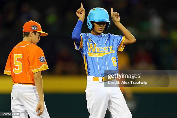 Daniel Leon of the West Team from Chula Vista, California celebrates after hitting a double against the Southwest Team from San Antonio, Texas at...