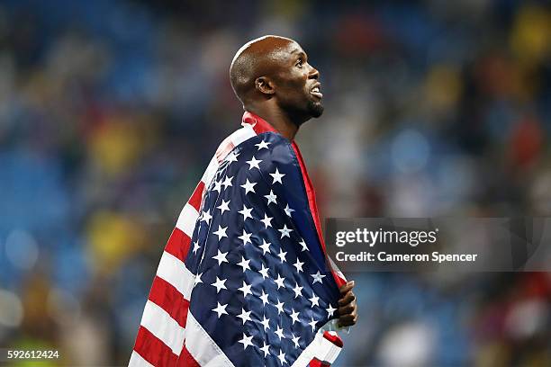 Lashawn Merritt of the United States reacts after winning gold in the Men's 4 x 400 meter Relay on Day 15 of the Rio 2016 Olympic Games at the...