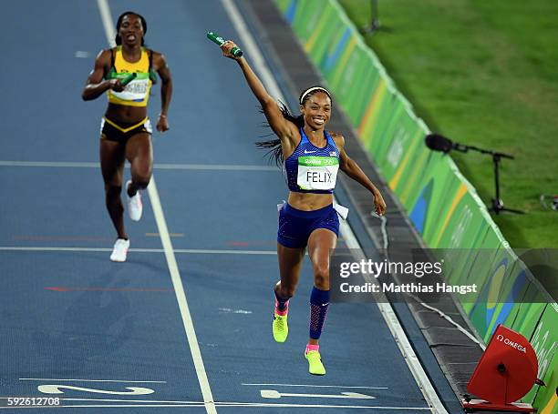 Allyson Felix of the United States reacts after winning gold during the Women's 4 x 400 meter Relay on Day 15 of the Rio 2016 Olympic Games at the...