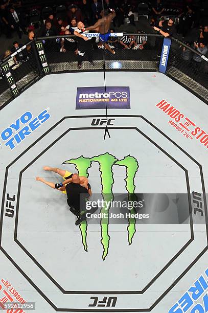 Anthony Johnson celebrates after defeating Glover Teixeira of Brazil in their light heavyweight bout during the UFC 202 event at T-Mobile Arena on...