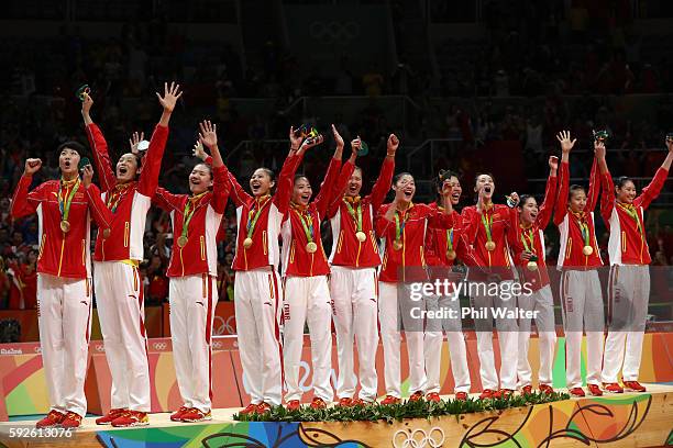 Gold medalists, China celebrates on the podium after the Women's Gold Medal Match between Serbia and China on Day 15 of the Rio 2016 Olympic Games at...