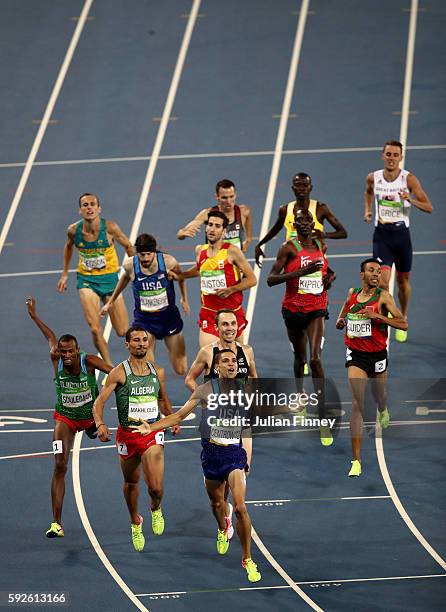 Matthew Centrowitz of the United States reacts after winning gold in front of Taoufik Makhloufi of Algeria and Nicholas Willis of New Zealand in the...