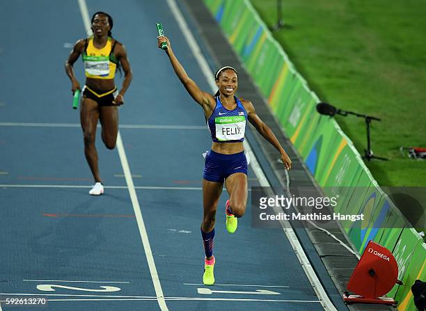 Allyson Felix of the United States reacts after winning gold during the Women's 4 x 400 meter Relay on Day 15 of the Rio 2016 Olympic Games at the...