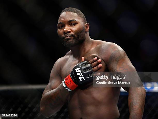 Anthony Johnson celebrates his first-round knockout win over Glover Teixeira in their light heavyweight bout at the UFC 202 event at T-Mobile Arena...