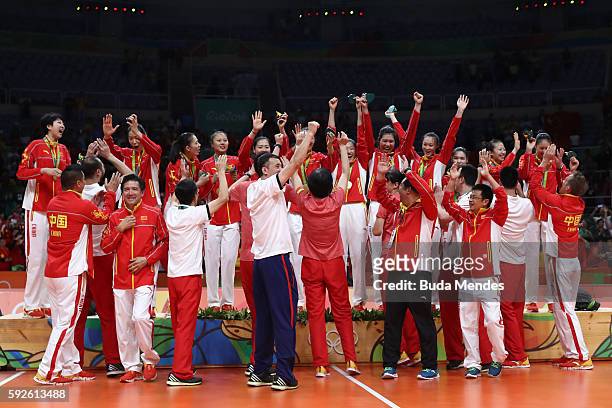 Team China celebrates after winning gold during the Women's Gold Medal Match between Serbia and China on Day 15 of the Rio 2016 Olympic Games at the...