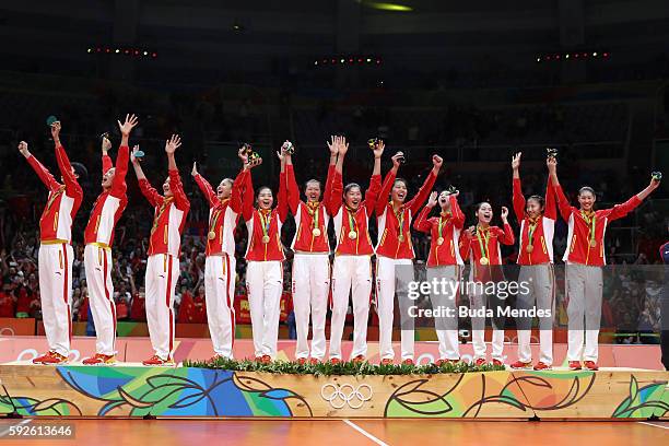 Team China celebrates winning gold during the Women's Gold Medal Match between Serbia and China on Day 15 of the Rio 2016 Olympic Games at the...