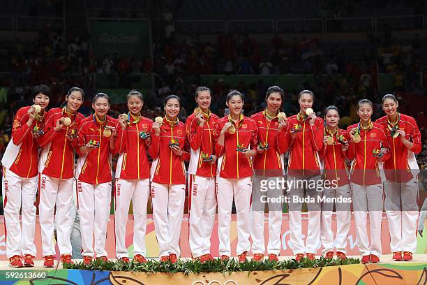Team China celebrates winning gold during the Women's Gold Medal Match between Serbia and China on Day 15 of the Rio 2016 Olympic Games at the...