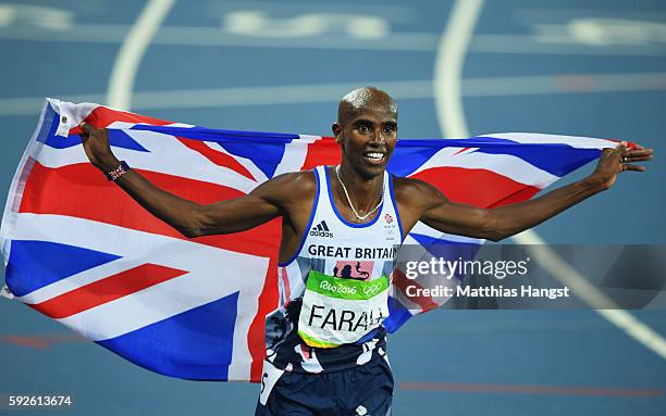 Mohamed Farah of Great Britain reacts after winning gold in the Men's 5000 meter Final on Day 15 of the Rio 2016 Olympic Games at the Olympic Stadium...
