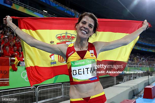 Ruth Beitia of Spain reacts after winning gold in the Women's High Jump Final on Day 15 of the Rio 2016 Olympic Games at the Olympic Stadium on...